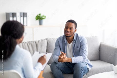 black man getting therapy